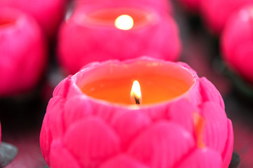 Obraz na płótnie Canvas Flower candles burning at night.