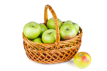 Green apples in wicker basket
