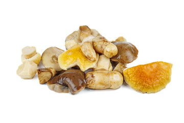 Pile of marinated birch bolete mushrooms isolated on a white background
