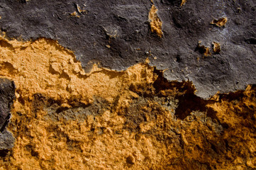 Black outside and yellow inside old pressboard