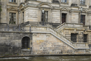 Sandstone facade with staircase balustrade from the berliner dom (berlin cathedral) on the river spree in the central Mitte district of Berlin, capital of Germany