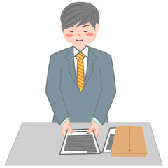 見積り書を提出する男性
