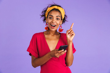 Portrait of a smiling young african woman in headband