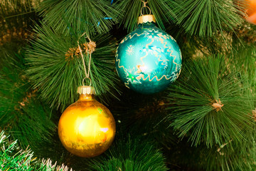 Toys balls on a Christmas tree.