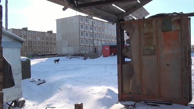 Ruins of snow abandoned house ghost town Coal Mines on far north of Russia. Hopelessness in deserted city. Unique place for stalkers.