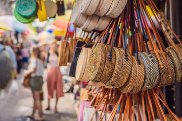 Famous Balinese rattan eco bags in a local souvenir market in Bali, Indonesia