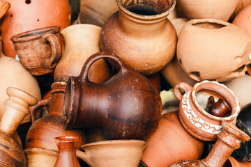 Fototapeta na wymiar A pile of old brown rustic pottery