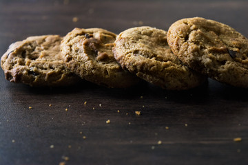 Cookies on dark wooden background