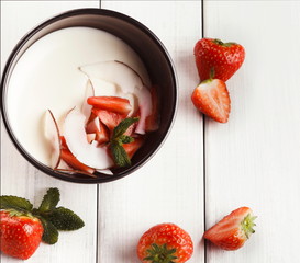 Coconut panna cotta with fresh strawberries