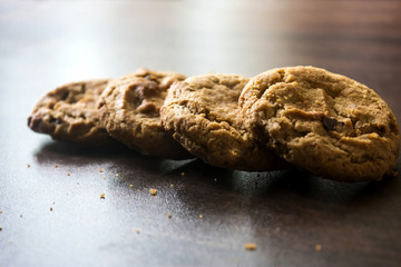 Cookies on dark wooden background