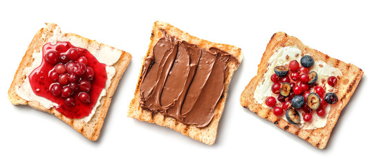 Different delicious sweet toasts on white background