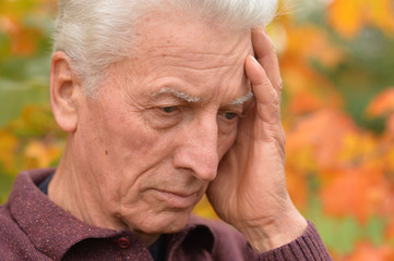 Close up portrait of thoughtful senior man