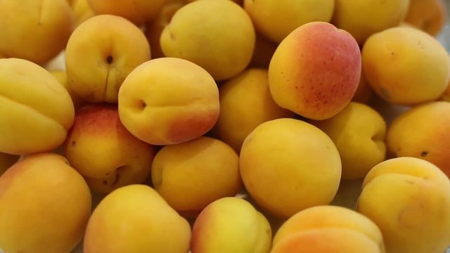 Fresh peaches on a plate close up