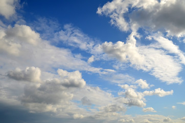 Blue sky with white clouds. Texture/Background