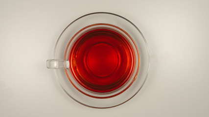 TOP VIEW: Black tea in a glass tea cup