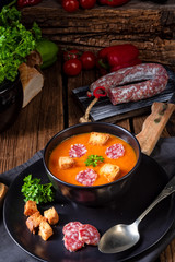 Hungarian paprika cream soup with spicy sausage