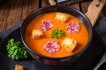Hungarian paprika cream soup with spicy sausage