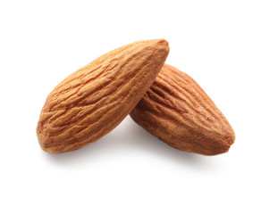 Obraz na płótnie Canvas Tasty almonds on white background