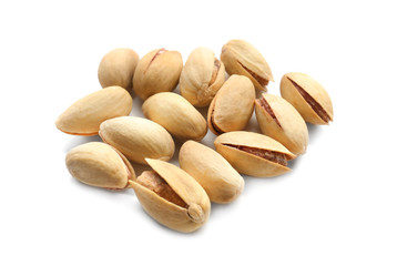 Tasty pistachio nuts on white background