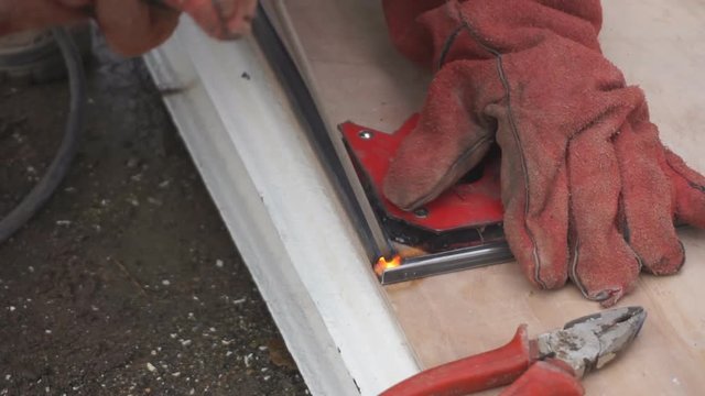technical technology torc welder brews metal on the street .