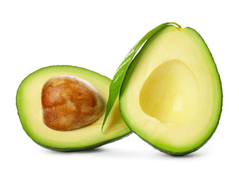 Halves of ripe avocado on white background