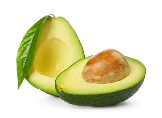 Halves of ripe avocado on white background