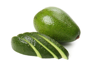 Ripe avocado with slices on white background