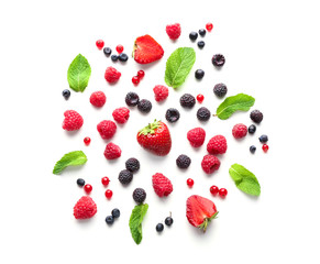 Delicious ripe berries on white background, top view