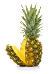 Cut ripe pineapple on white background