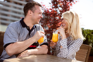 happy couple enjoying a coffee at the coffee shop,outdoor