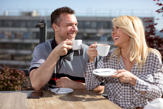 happy couple enjoying a coffee at the coffee shop,outdoor