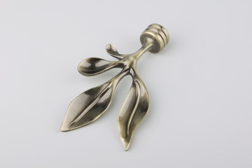 Tips for curtain poles on a white background. Ending for curtain eaves. Finials for curtain cornices.