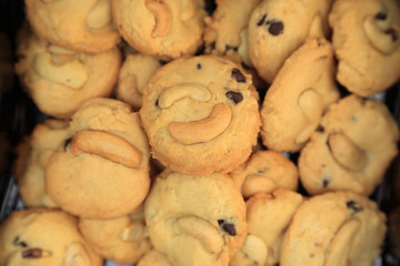 Almond and chocolate chip cookies in a box.