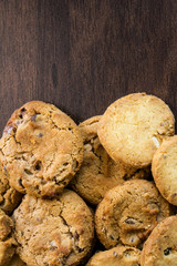 Cookies on dark wooden background
