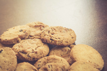 Cookies on dark wooden background