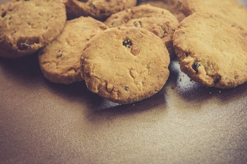 Cookies on dark wooden background