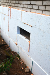 Waterproofing  insulating old  house foundation
