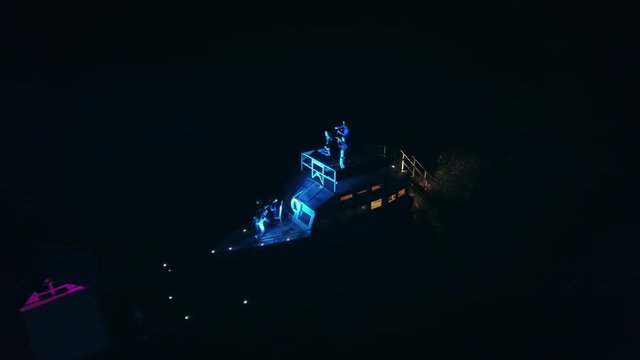 Aerial shot: Night action. A scene of recognition in love, a request of the hand and heart on the ship