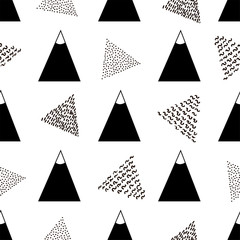 Seamless pattern with black mountain and triangles on the white background.
