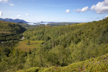 Happy walking in Norwegian mountain in Northerh Norway