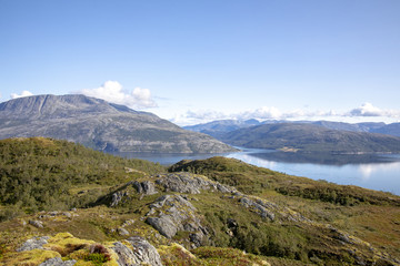 Fototapeta na wymiar Happy walking in Norwegian mountain in Northerh Norway