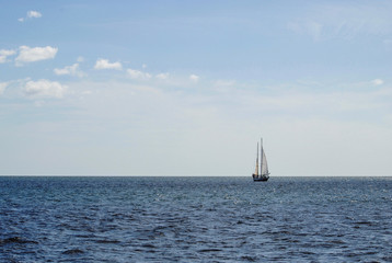 Sail Boat on the Ocean Horizon