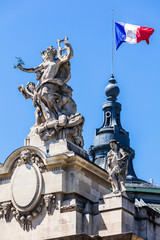 Obraz premium French flag waving on top of the Grand Palais. Paris, France