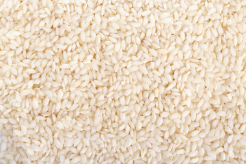 Raw white rice as background