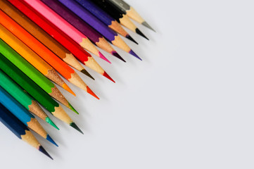 Scale colour of coulour pencil,Colour pencil rainbow style,Colour pencil lay on white paper,Multi colour pencil,Seletive focus