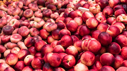Fresh organic nectarines on the farmers market in Paris, France