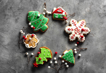 Frame made of Christmas cookies on grey background