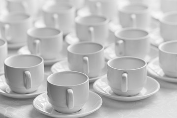 Many rows of pure white cup. Black and white