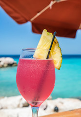   A pretty pink cocktail Curacao Views - a small Caribbean Island