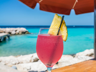   A pretty pink cocktail Curacao Views - a small Caribbean Island
